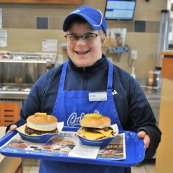client serves burgers at Culvers