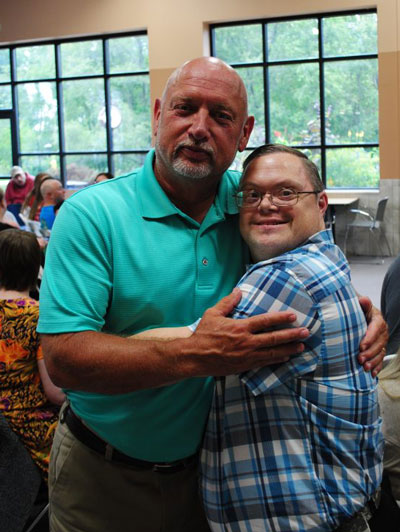 Executive Director John Wayne Barker with Scott