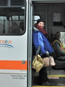 Client on Newtrax vehicle with driver